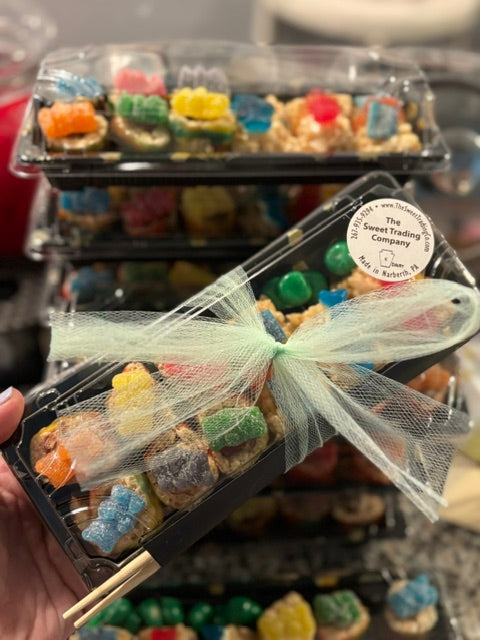 Trays filled with rice krispy candy sushi