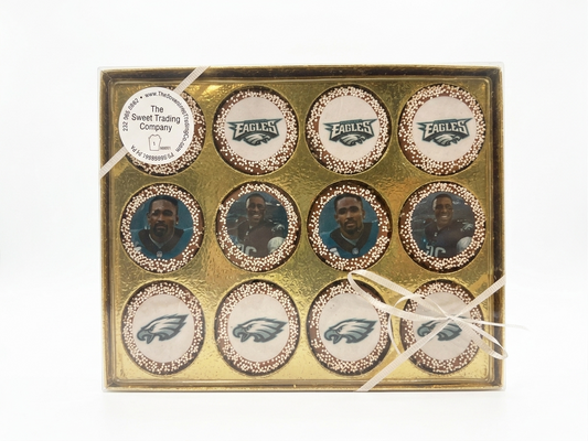 A box of chocolate dipped oreos with eagles logos