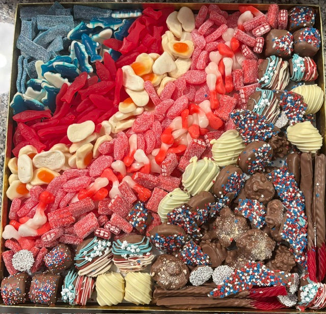 Tray filled with Red White and Blue candy and chocolates